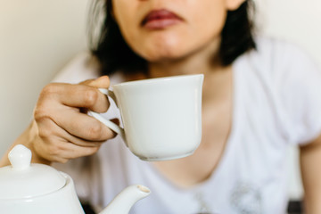 woman with cup of coffee