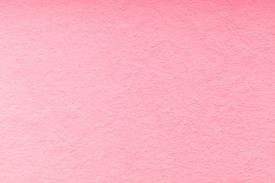 blank old pink paper texture background. Structure of dense rose cardboard
