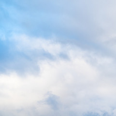 Fototapeta premium gray and white clouds in blue winter sky