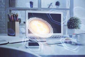 Multi exposure of blockchain and crypto economy theme hologram and table with computer background....