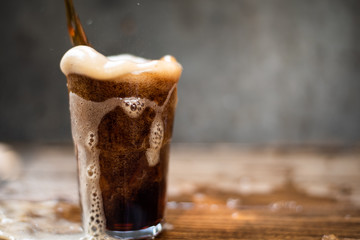 sparkling water splashing on grey background.