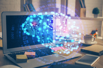 Double exposure of work table with computer and brain sketch hologram. Brainstorming concept.