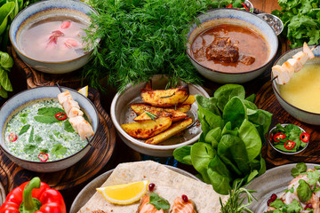 Traditional Georgian cuisine. Matzoon Okroshka, Khash Chikhirtma Harcho Soup, Dolma Chanakhi Chashululi Chkmeruli Kupati