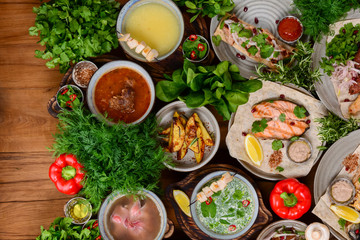Traditional Georgian cuisine. Matzoon Okroshka, Khash Chikhirtma Harcho Soup, Dolma Chanakhi Chashululi Chkmeruli Kupati