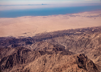 Aerial view of mountains in the Sinai through an airplane window