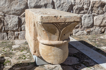 The capital from the crusader period found at Nebi Samwil in the yard of the exhibit of the Museum...