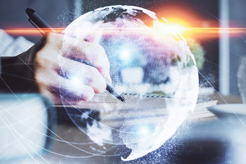 International business hud over woman's hands writing background. Concept of hard work. Double...