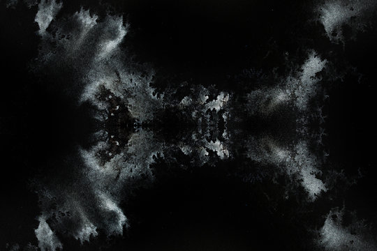abstract splashes on black background. monochrome image.