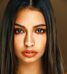 cute happy young indian woman in studio closeup smiling, fashion beauty