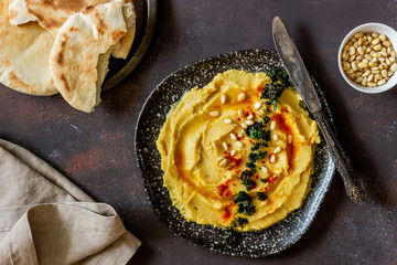 Hummus on a rusty background. Pete. Recipes. Vegetarian food. Healthy eating.