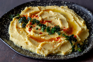 Hummus on a rusty background. Pete. Recipes. Vegetarian food. Healthy eating.