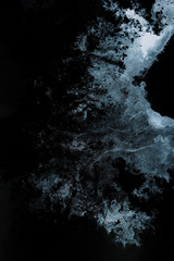 abstract splashes on black background. monochrome image.