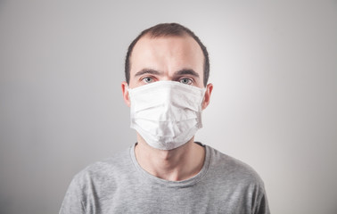 Caucasian man with medical mask.