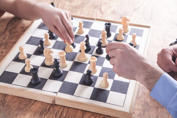 Playing chess game. Competition strategy concept