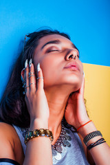 Obraz premium lifestyle people concept. young pretty smiling indian girl with long nails wearing lot of jewelry rings, asian summer happy cool close up