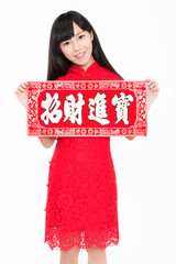 beautiful girl holding couplet celebrating chinese new year,word meaning is blessing good luck.