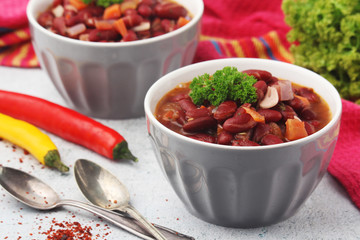 Two bowls with traditional Georgian dish - lobio