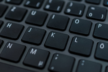 Photo macro digital keyboard computer for business on the dark and little light
