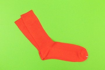 colorful socks on green background  - Image
