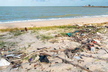 Fototapeta na wymiar Waste and plastic garbage at beach