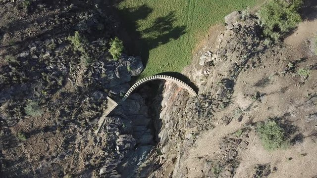 4K aerial drone summer day video of African savanna, Stengel water dam surrounded by bushy hills, Daan Viljoen National Reserve, Khomas Hochland area near Windhoek, Namibia's capital, southern Africa