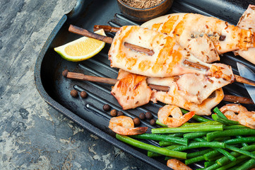 Grilled squid on a skewer