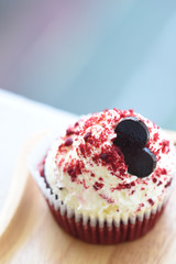 red velvet cupcake on the wood plate 