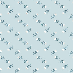 White flowers diagonal striped seamless vector pattern on a blue background. Romantic light surface print design. Great for girly fabrics, cards, wedding invitations, and wrapping paper.