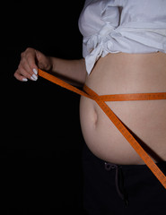 Belly, which is measured with a centimeter tape