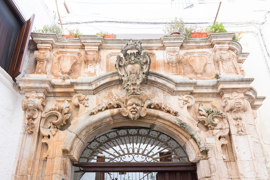 baroque gate of Palazzo Morelli in Locorotondo, Italy