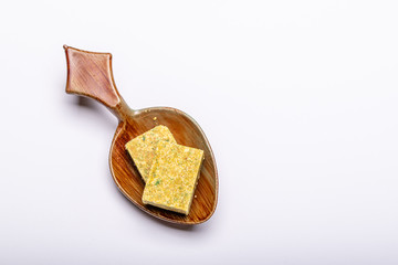 Bouillon stock cubes isolated on white background