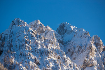 Mountain peak covered with snow blanket