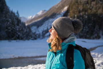 Woman enjoying the warm sun on her face