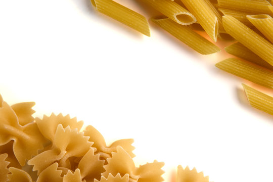 Uncooked pasta isolated on white background image