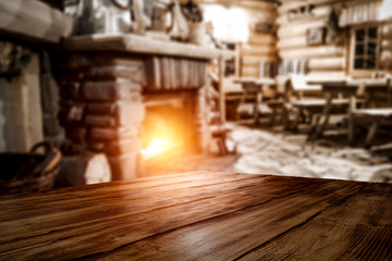 Obraz na płótnie Canvas desk of free space and home interior with fireplace 