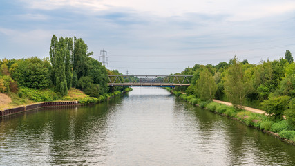 Fototapeta premium The Rhine-Herne Canal, seen from the Nordsternpark, Gelsenkirchen, North Rhine-Westfalia, Germany