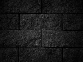 Black wall as background, texture of a black brick wall.Brick texture.