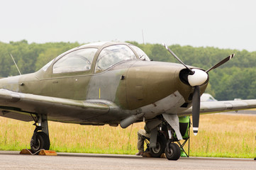 Fototapeta na wymiar Old historic military propeller plane at the airshow in Volkel, Netherlands