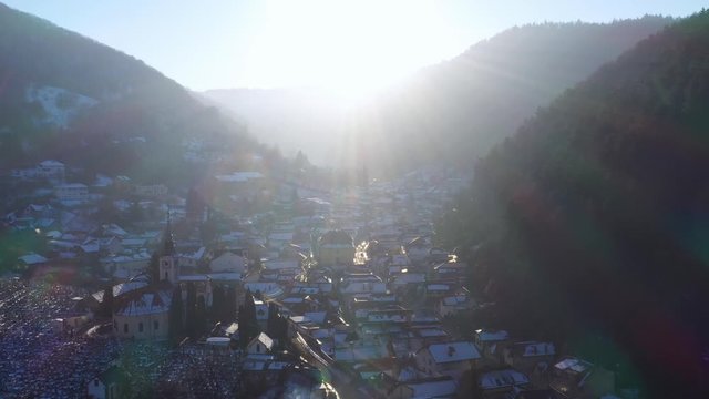Aerial drone 4k clip of Brasov historical neighborhood Schei at sunset on a beautiful winter day