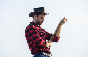 Ranch worker. Eco farm. Farming concept. Handsome man in hat and rustic style outfit. Keep ranch....