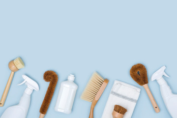 Concept of natural cleaning with brushes, detergent bottles and cloth