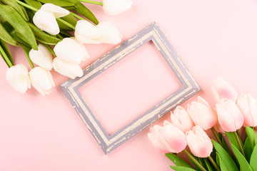 Obraz na płótnie Canvas Happy Women's Day, Mother's Day concept. top view flat lay photo frame and Tulip flower