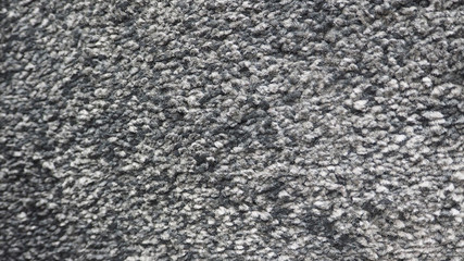 Stoense rug low pile for texture and background.IT is dark grey color.