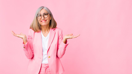 middle age cool woman feeling puzzled and confused, doubting, weighting or choosing different...