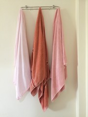 three towel on the wall