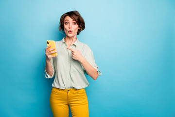 Photo of pretty lady hold telephone open mouth indicating finger screen advising low shopping smart...