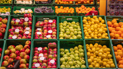 fresh fruits and vegetables on store shelves
