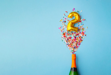 2nd anniversary champagne bottle balloon pop - obrazy, fototapety, plakaty