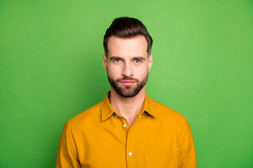 Fototapeta premium Close-up portrait of his he nice attractive calm serious guy wearing casual formal shirt modern look haircut isolated on bright vivid shine vibrant green color background