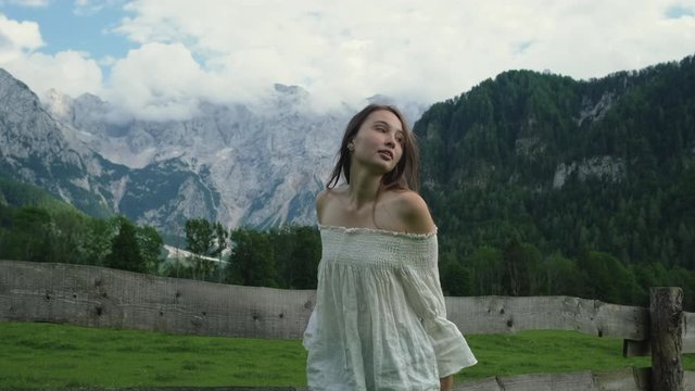Girl enjoying the time in mountain countryside